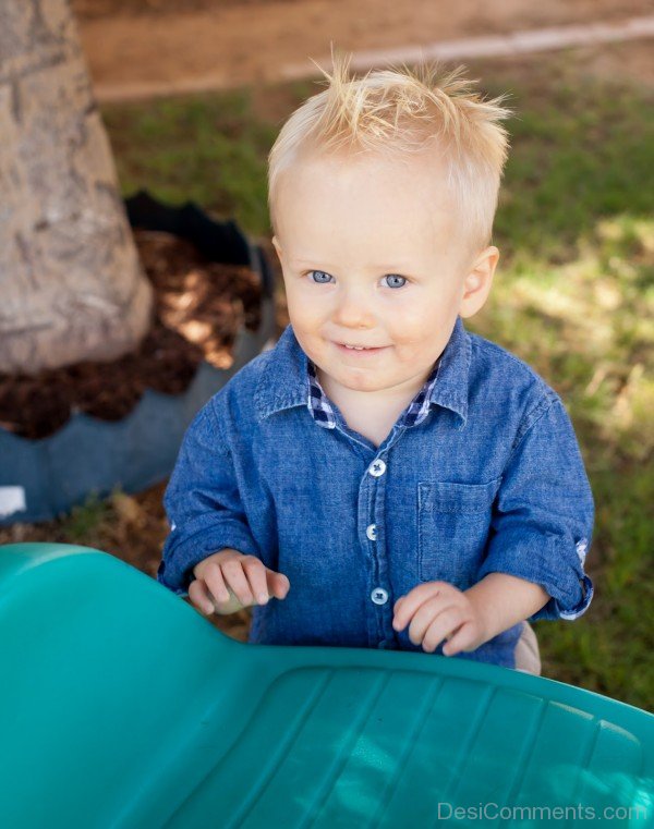 Baby Boy In Blue Shirt