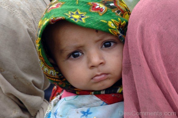 Baby Girl In Green Scarf