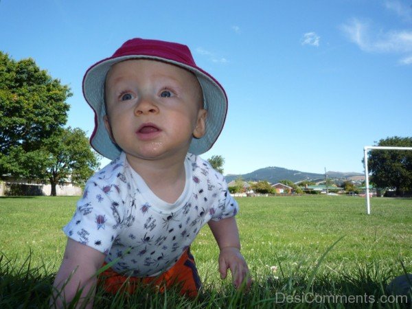 Baby Playing In Garden