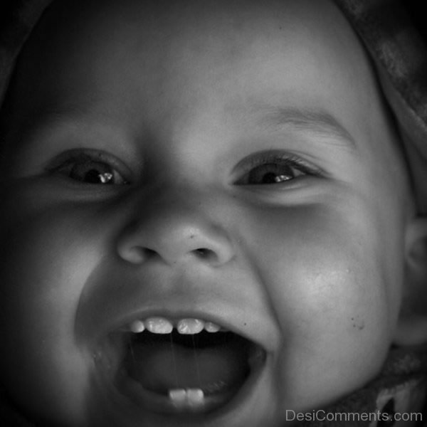 Baby Showing The Teeth