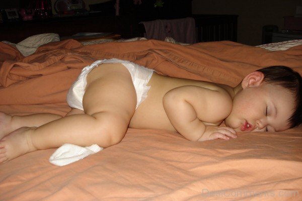 Baby Sleeping On Bed
