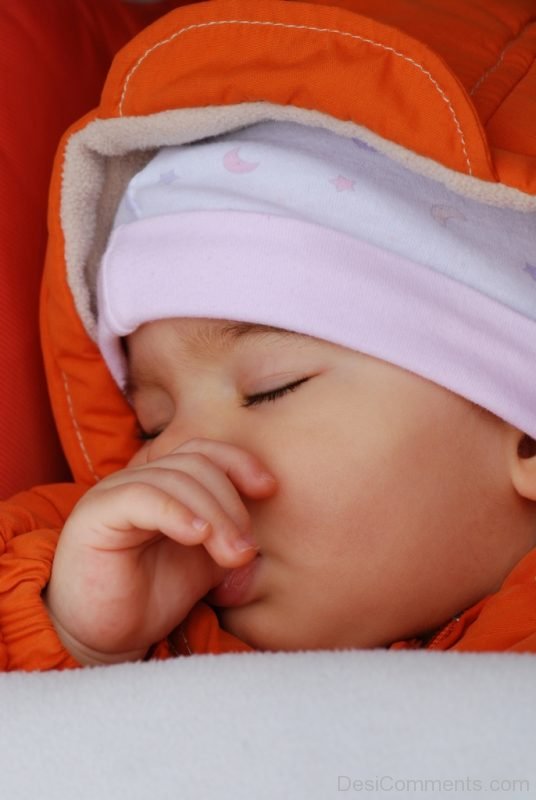 Baby Wearing Orange Dress