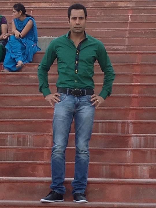 Binnu Dhillon Wearing Green Shirt