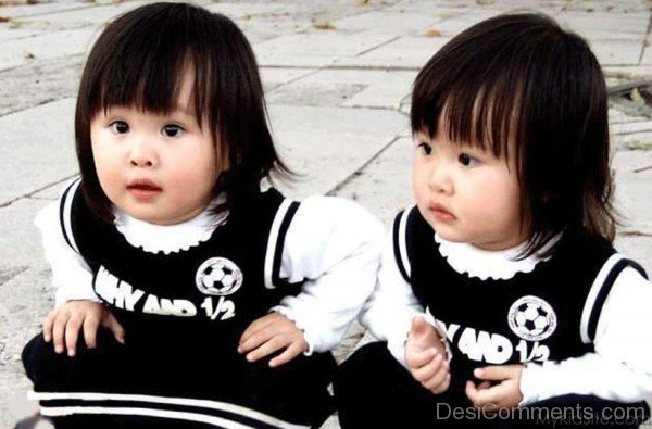 Cute Twin Baby Girls