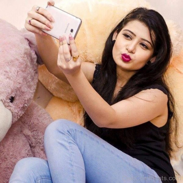 Ena Saha Holding Phone Image-DC186