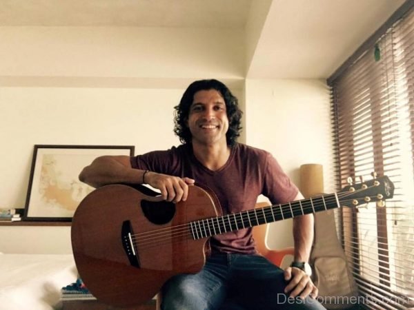 Farhan Akhtar Holding Guitar Image