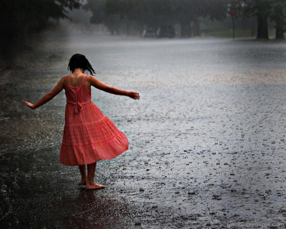 Girl Enjoying Rainy Season