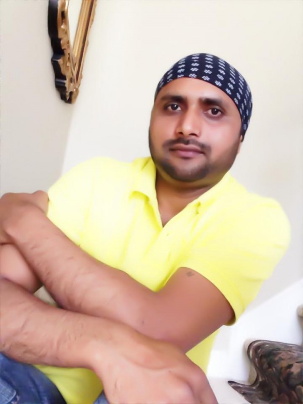 Gurminder Guri Wearing Yellow t-shirt 