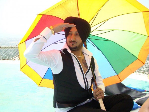 Inderjit Nikku Posing With Umbrella