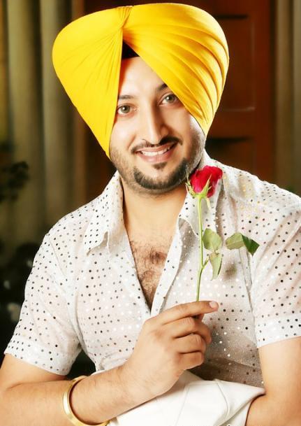 Inderjit Nikku With Rose