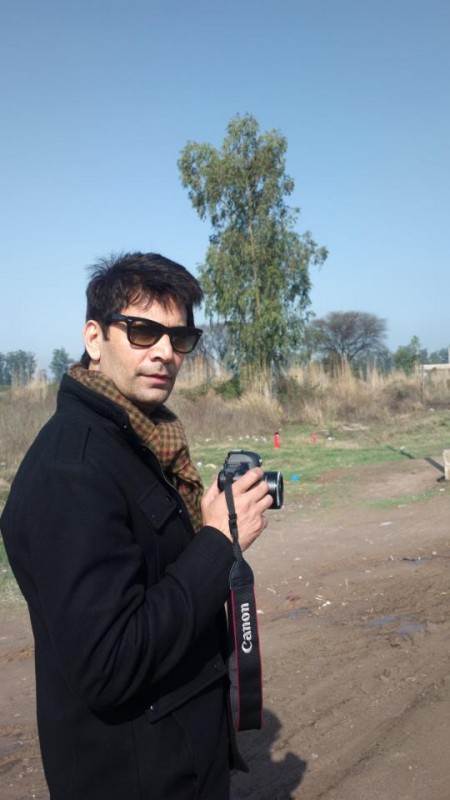 Jasbir Jassi Holding A Camera