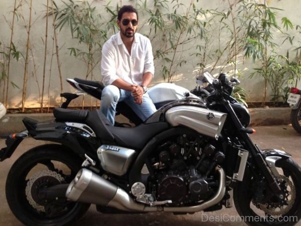 John Abraham With Two Bikes-DC43