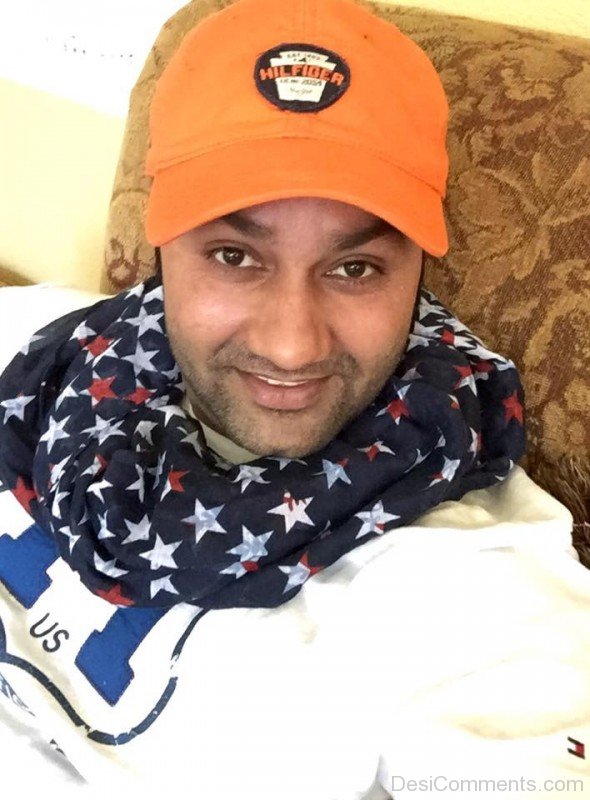 Lakhwinder Wadali In Orange Cap Image