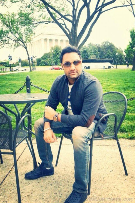 Lakhwinder Wadali Sitting On Chair