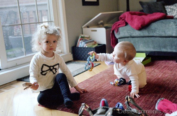 Lovely Brother And Sister Playing