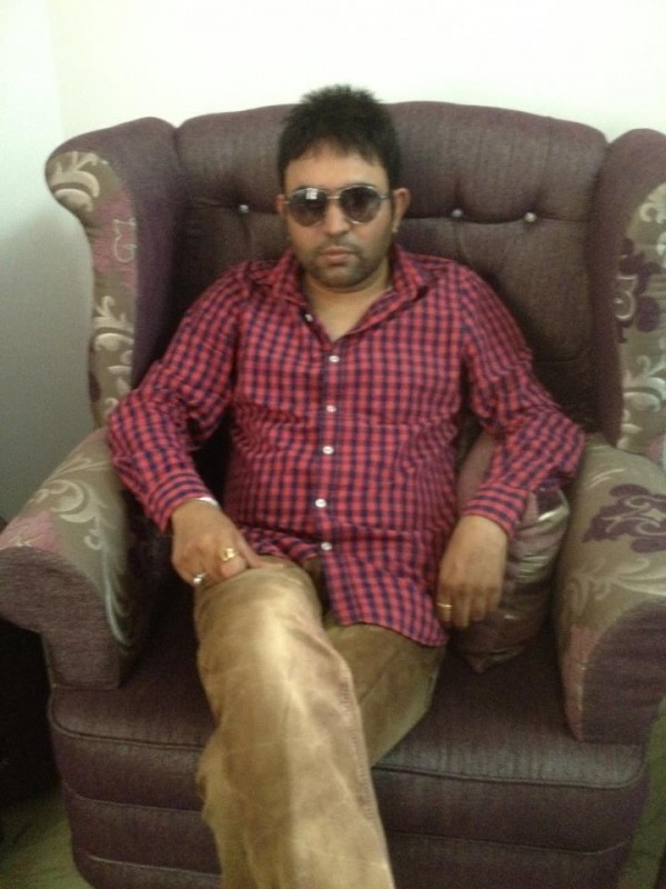 Mangi Mahal is Sitting On Sofa