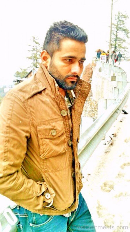 Maninder Batth In Brown Jacket