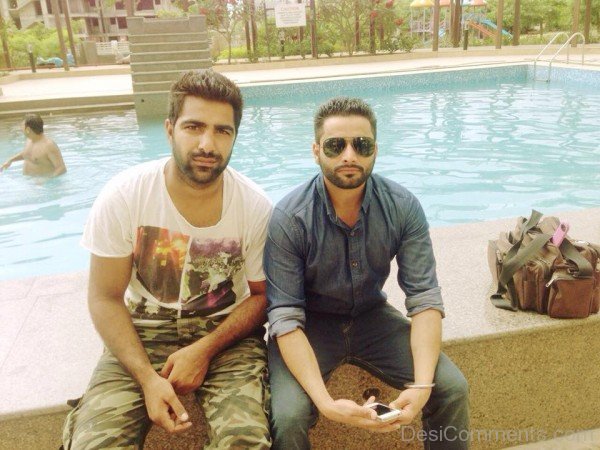 Maninder Batth Sitting Near Swimming Pool