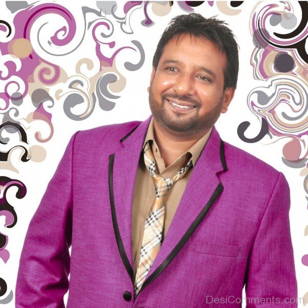 Manjit Pappu In Purple Coat