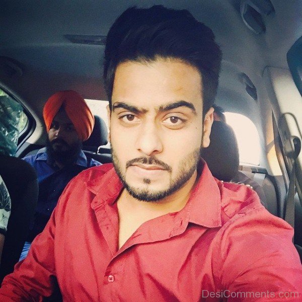 Mankirt Aulakh In Red Shirt
