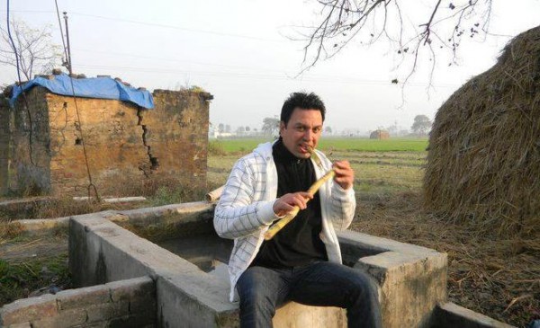 Manmohan Waris Is Eating A Sugar Cane