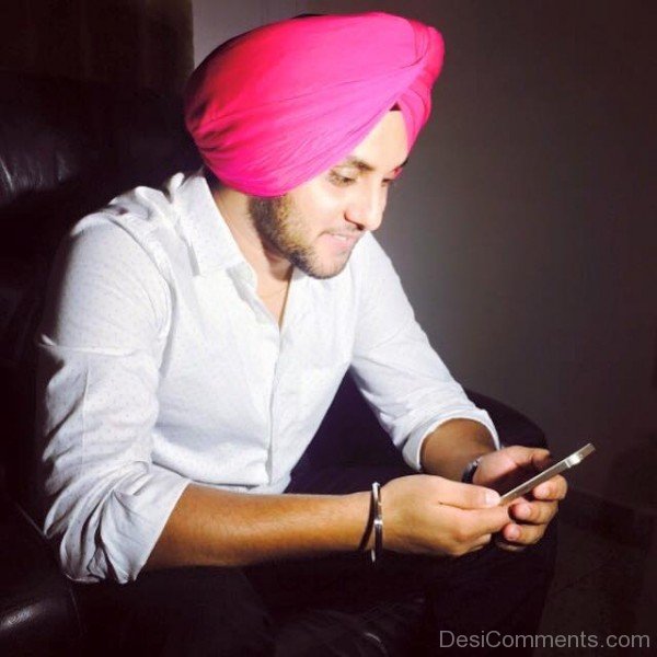 Mehtab Virk Using Phone