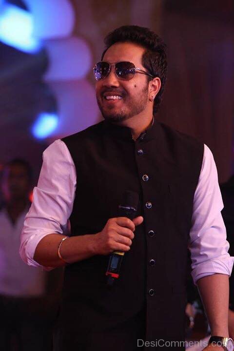Mika Singh Holding Mic