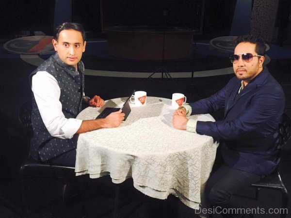 Mika Singh Sitting On Chair