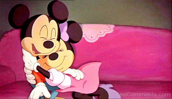 Minnie Mouse On Micky Mouse Arms