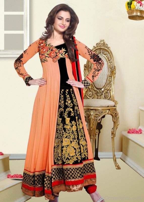 Monica Bedi In Coral And Black Faux Georgette Anarkali Suit