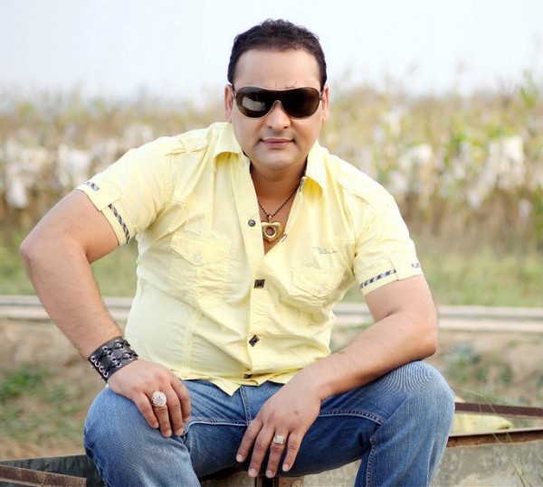 Nachattar Gill Wearing Yellow T-shirt With Jeans