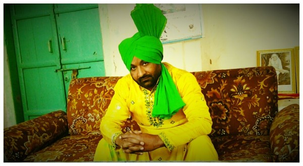 Nirmal Sidhu Sitting On Sofa