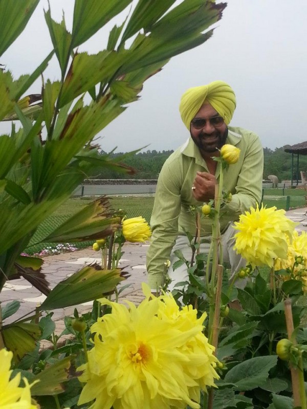 Pammi Bai Giving A Pose With Flowers