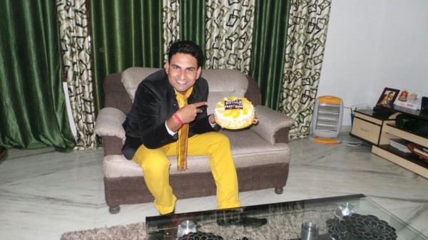 Preet Brar Holding A Cake