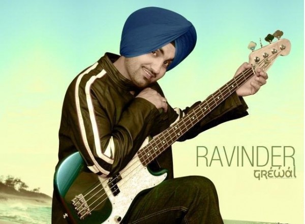 Ravinder Grewal Giving A Pose With Guitar