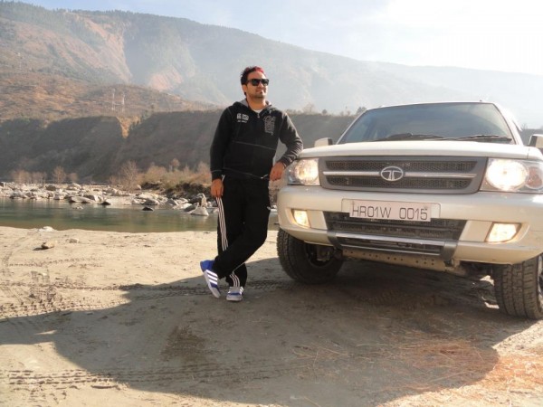 Resham Singh Anmol Giving A  Pose With Car
