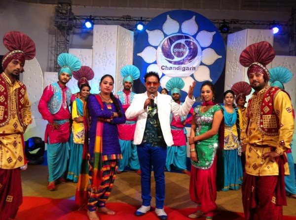 Resham Singh Anmol With A Bhangra Group