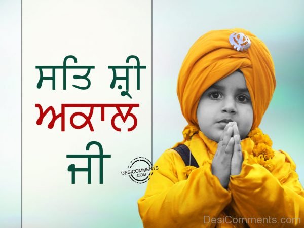 S at Sri akal with sikh child