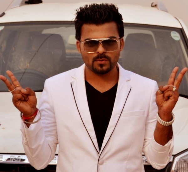 Sarthi K-Showing Victory Sign