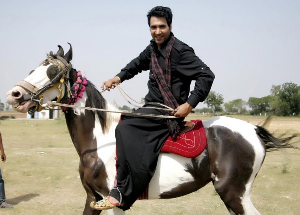 Satwinder Bugga Sitting On Horse