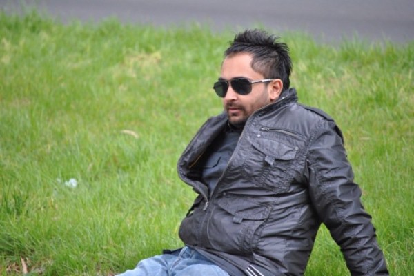 Sharry Maan Wearing Black jacket