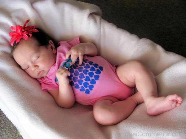 Sleeping Baby In Pink Dress