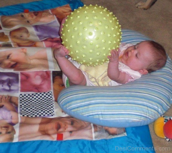 Small baby Playing With Toy