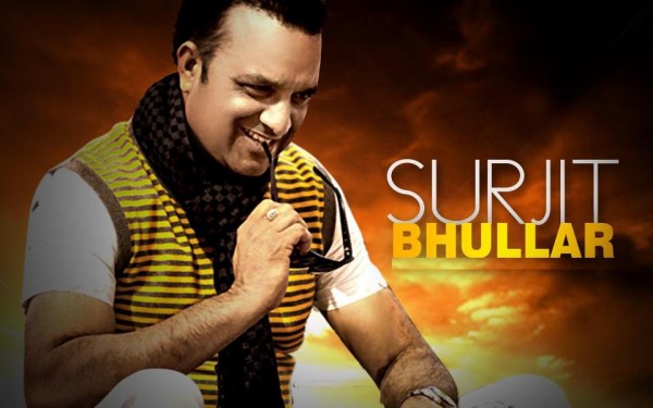 Surjit Bhullar Holding Sunglasses