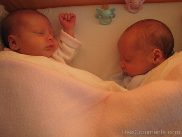 Two Cute Babies Sleeping