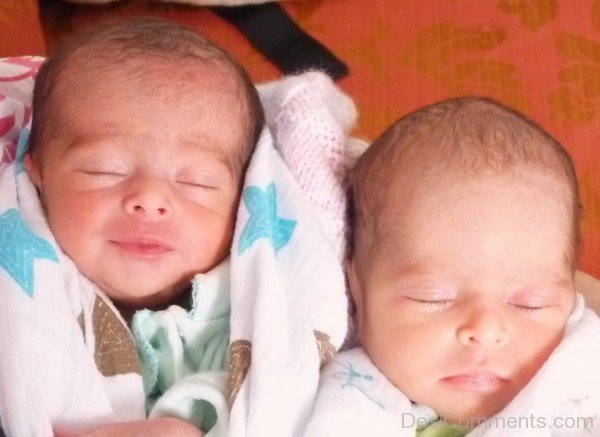 Two Cute Babies Sleeping
