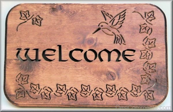 Welcome On Wooden Board